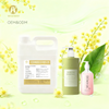 Bottle of premium golden mimosa fragrance oil for handmade soap and luxury candle making