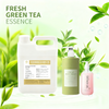 Premium Green Tea Fragrance Oil bottle for soap and candle making on a wooden background.