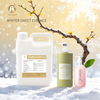Bottle of premium wintersweet fragrance oil for handmade soap and luxury candle making.